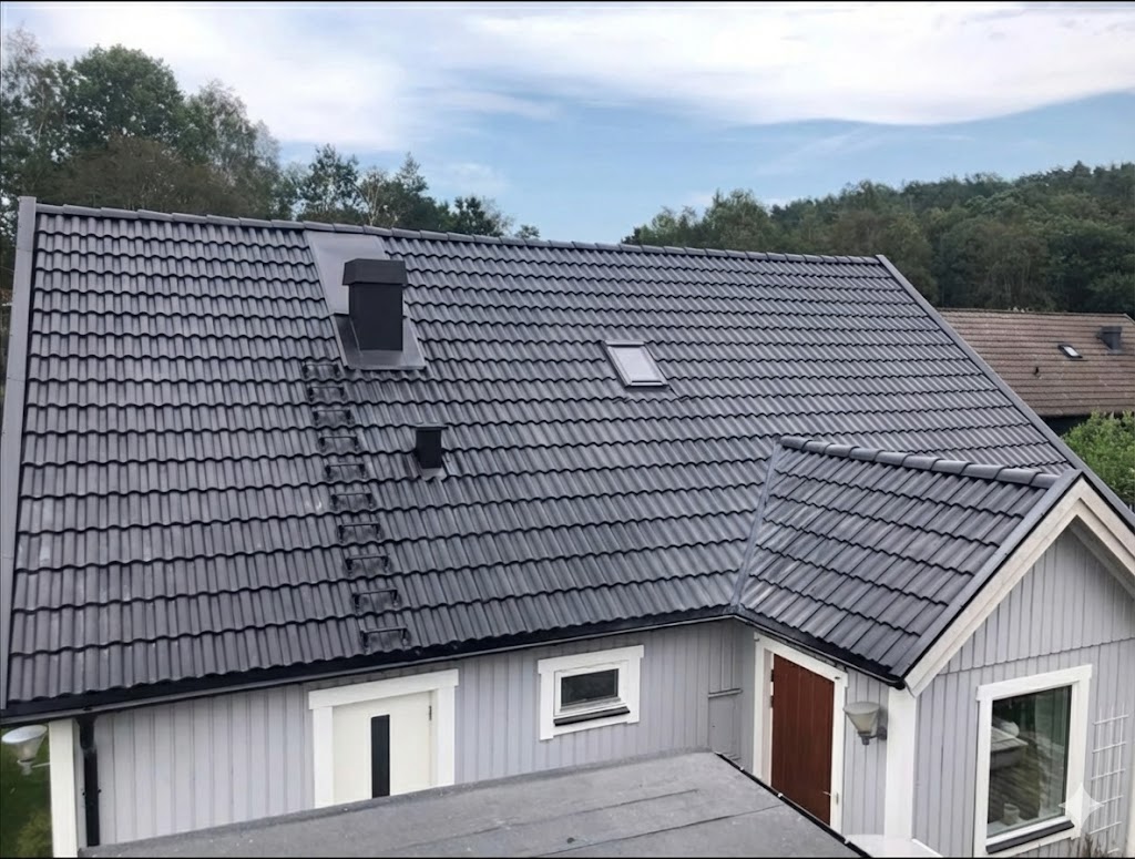Takbyte villa med tegelpannor
