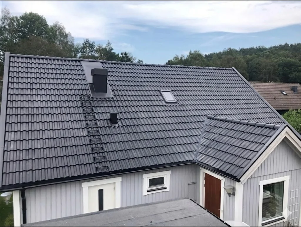 Takbyte villa med tegelpannor